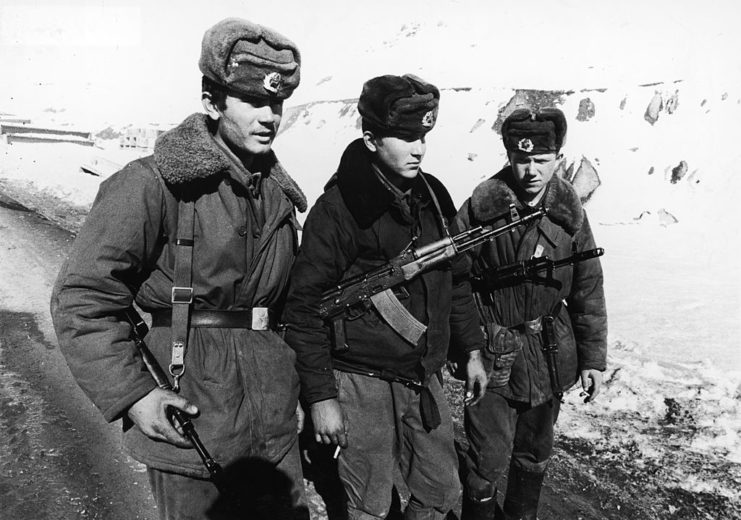 Three Soviet soldiers in uniform