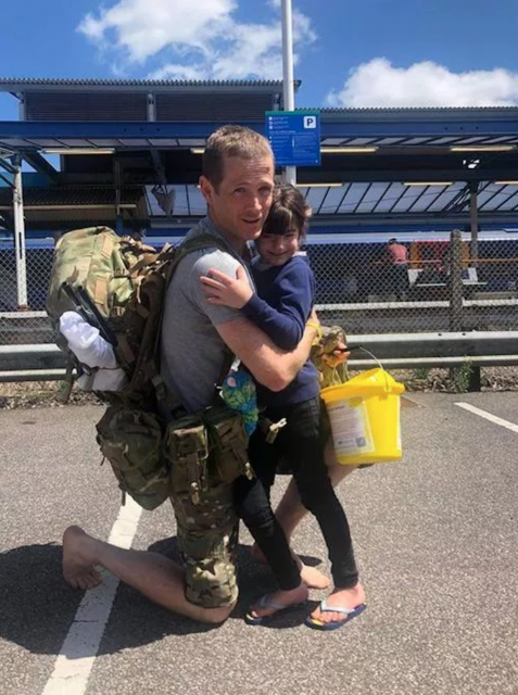 Chris Brannigan hugging Hasti