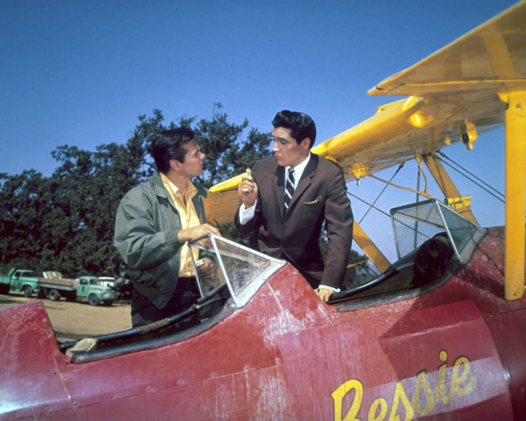 Elvis next to Stearman biplane