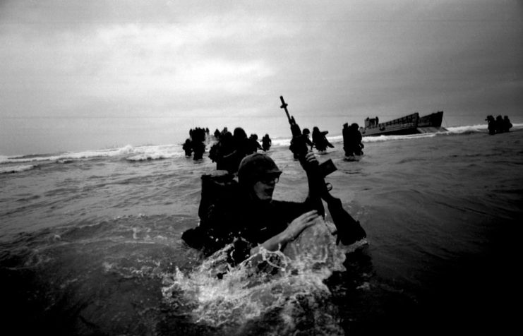 US Marine wading through water