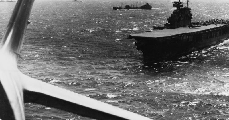 Yorktown conducts aircraft operations in the Pacific sometime before the battle. A fleet oiler is in the near background.