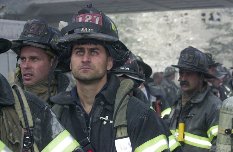 Firefighters standing together in uniform