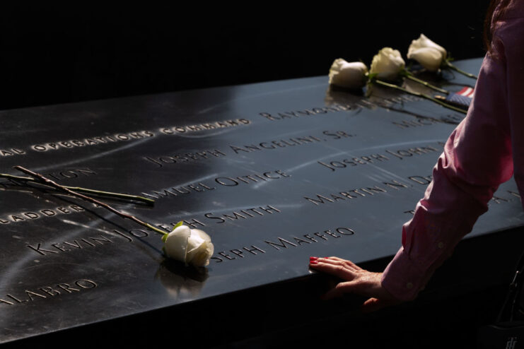 Roses placed on a plaque at the September 11 Memorial and Museum