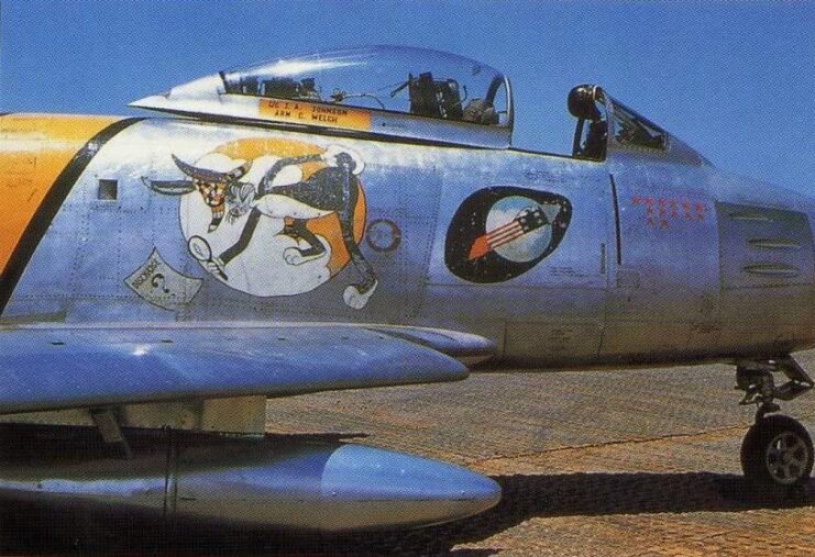 Side view of the North American F-86E Sabre 'Ohio Mike' parked on a runway