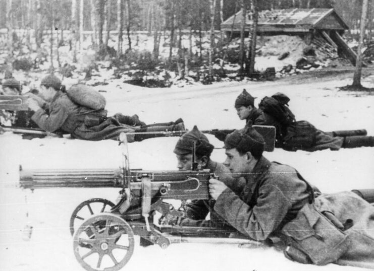 Red Army machine gunners aiming their weapons in the snow