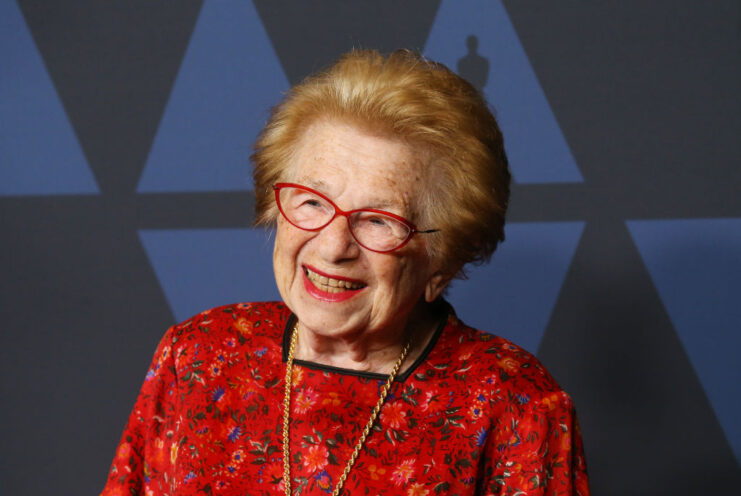 Dr. Ruth Westheimer standing on a red carpet