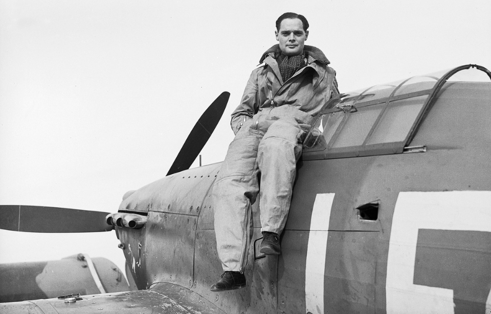 Douglas Bader sitting on the exterior of a Hawker Hurricane