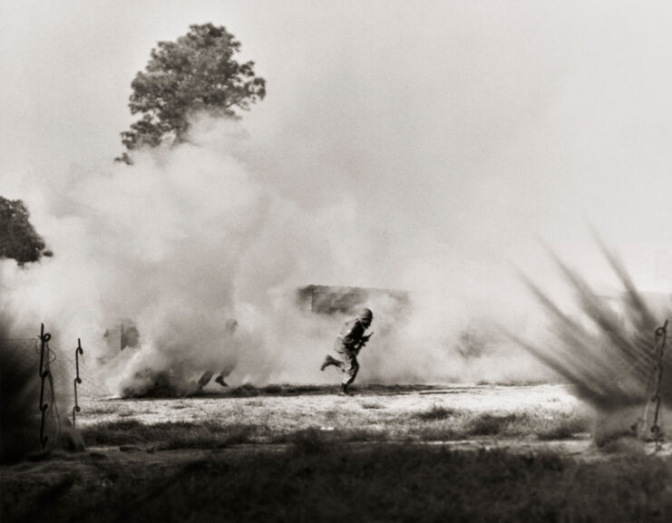 US Army Ranger running through a cloud of smoke