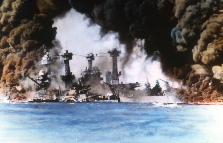 USS West Virginia (BB-48) and Tennessee (BB-43) shrouded in smoke