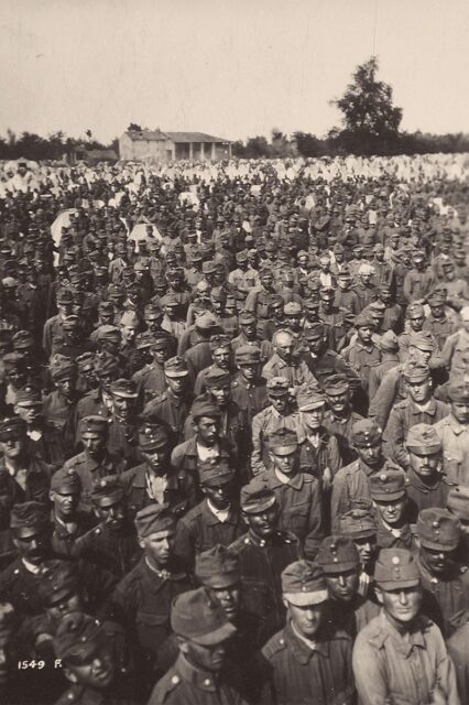 Austro-Hungarian prisoners of war (POWs) crowded together outside