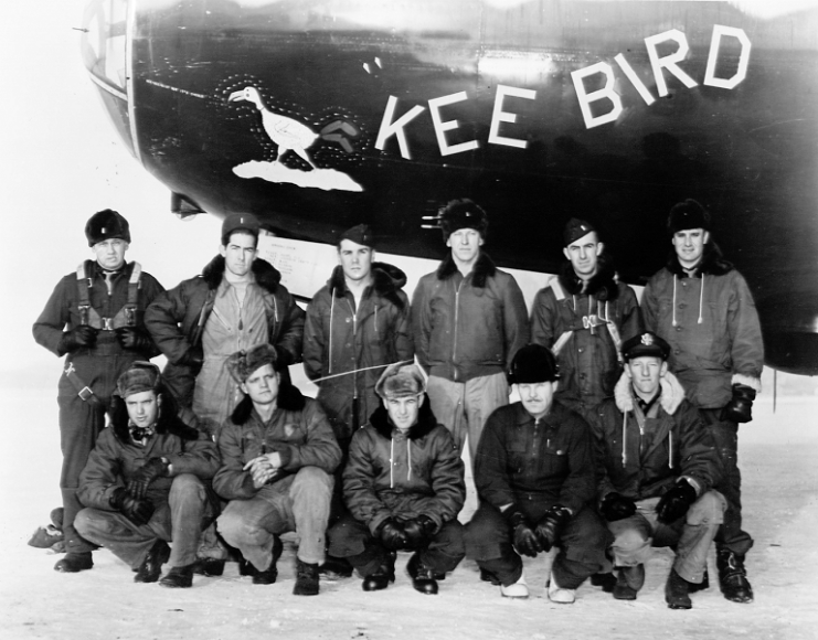 Crew of the Boeing B-29 Superfortress 'Kee Bird' standing with the aircraft