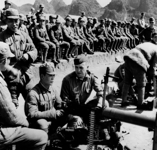 American and Chinese soldiers gathered together outside