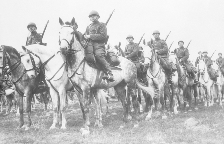 Polish cavalrymen sitting on horses