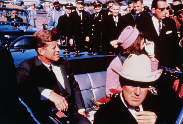 John Connally sitting in a convertible with John F. and Jackie Kennedy