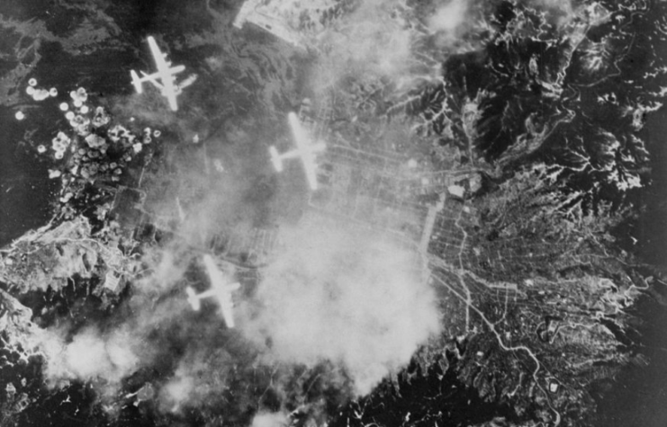 Three Boeing B-29 Superfortresses flying over Japan