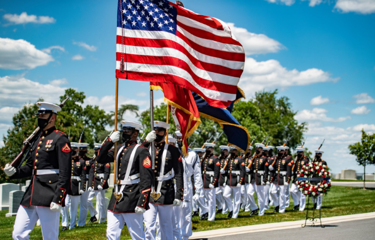 procession with flag for John Warner's memorial ceremony