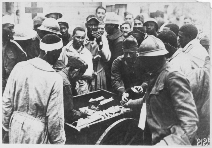 American Red Cross workers handing out chocolate to soldiers