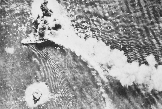 Aerial view of smoke rising from a Japanese ship at sea