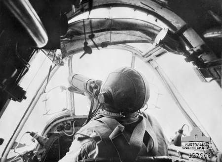 Flight Lt. R.F. "Torchy" Uren sitting in the cockpit of a Bristol Beaufighter