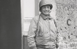 Theodore Roosevelt, Jr. standing in a doorway in military attire