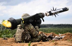 US cavalryman firing an FGM-148 Javelin while sitting on the ground