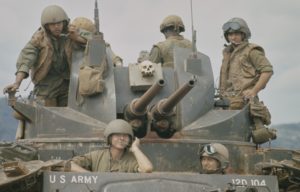 M42 Duster with soldiers on top and inside.