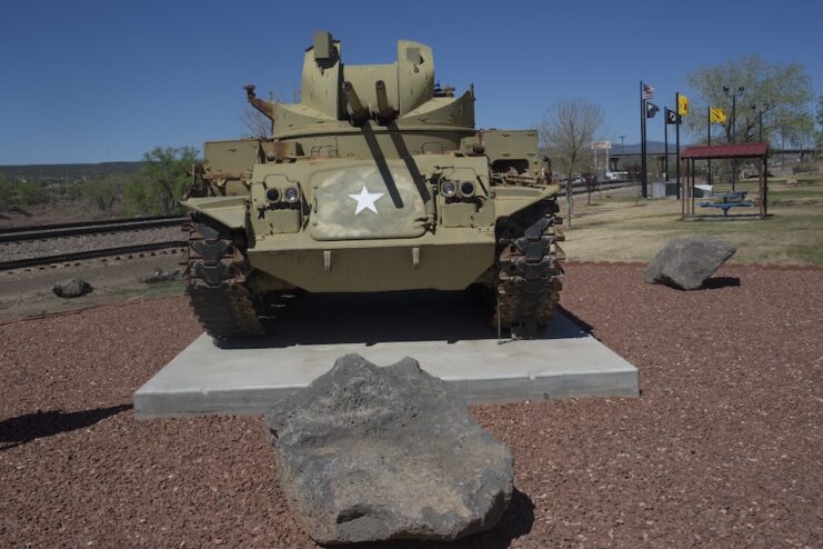 An army M42 Duster on display outside on the side of route 66.