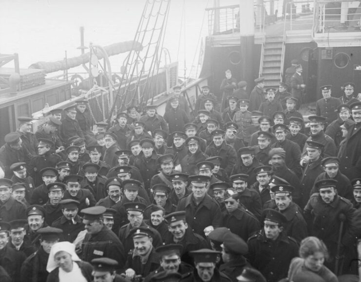 British soldiers standing on the deck of a ship