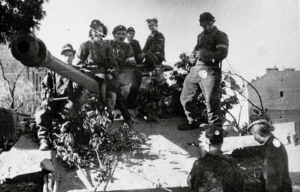 Polish Scouts sitting atop a tank