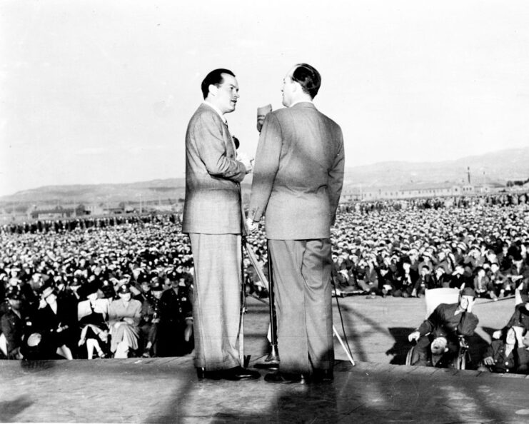 Bob Hope and Bing Crosby performing in front of American service members