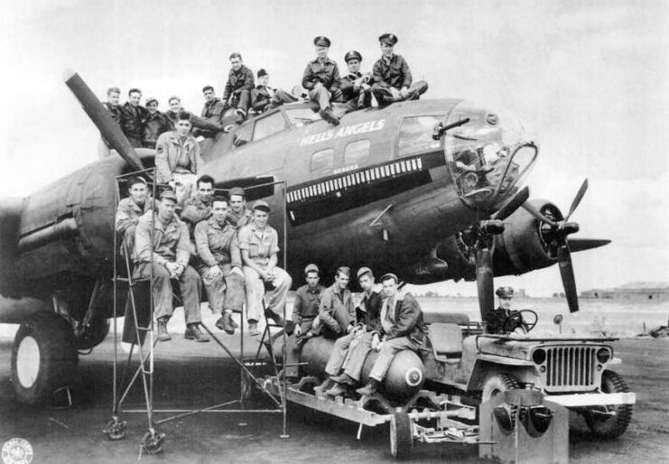 Airmen sitting atop the Boeing B-17F Flying Fortress 'Hell's Angels'