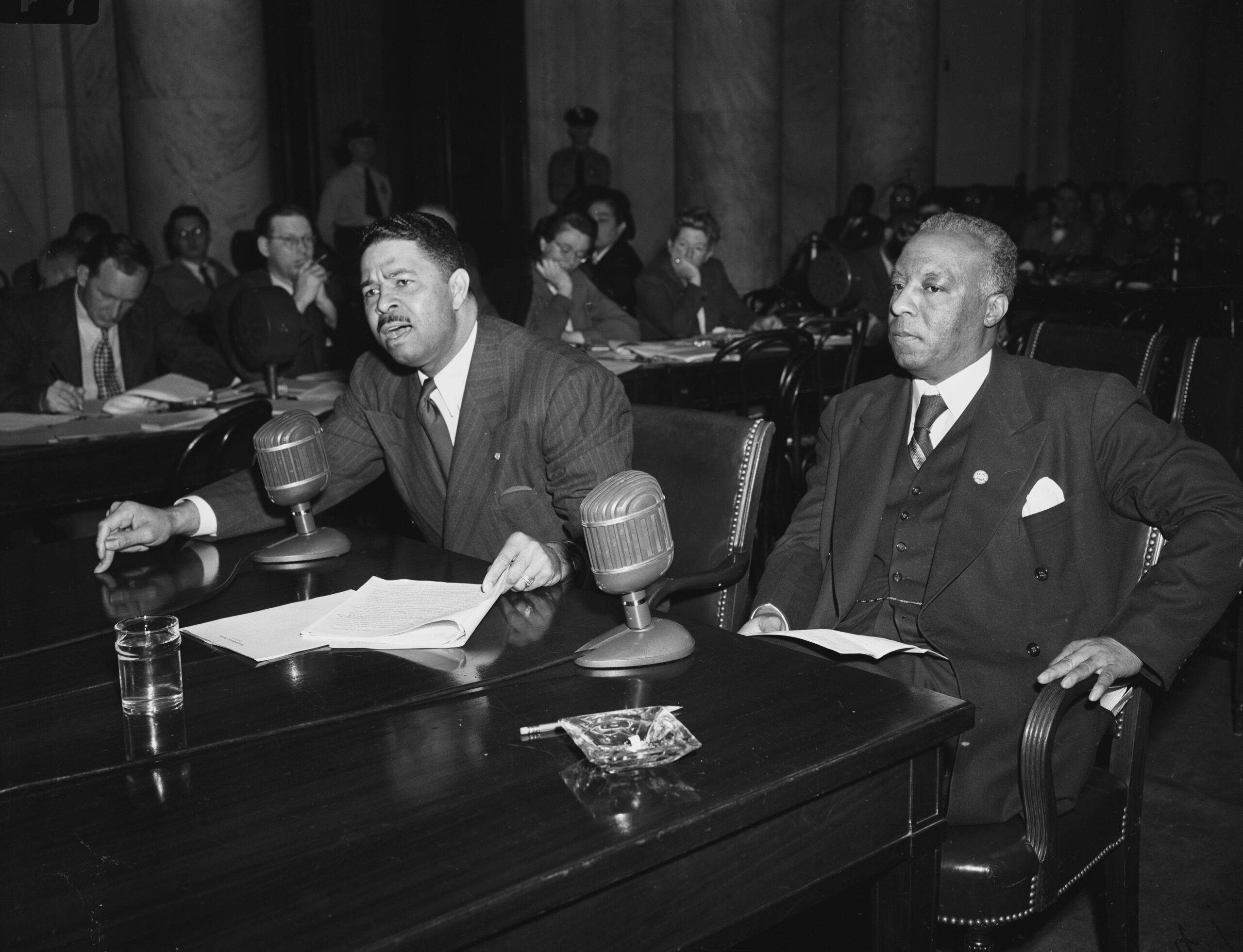 Grant Reynolds (L) and A. Philip Randolph (R) testify before the Senate Armed Services committee calling for safeguards against racial discrimination in draft legislation.