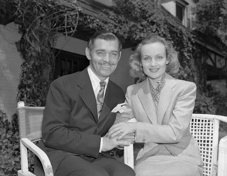 Clark Gable and Carole Lombard sitting together
