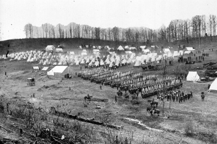 Members of the 96th Pennsylvania Regiment standing in lines at camp