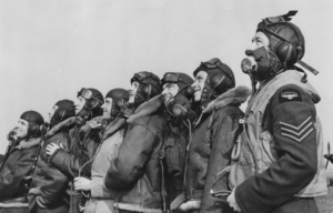 Eight RAF pilots standing together in their uniforms