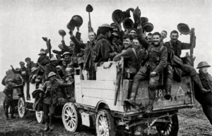 Canadian soldiers sitting on the back of a truck