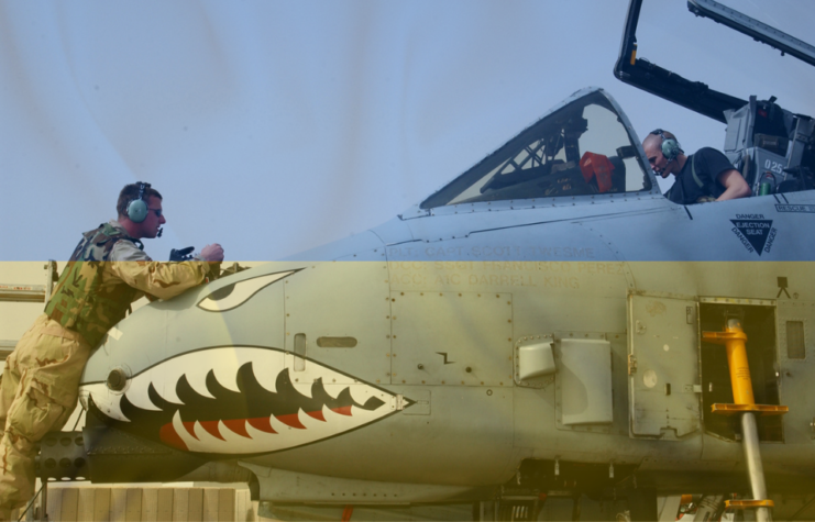 US Air Force crewman performing maintenance on the nose of a Fairchild Republic A-10 Thunderbolt II + Ukrainian flag