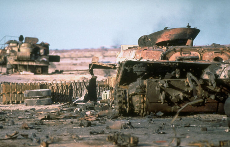 Two destroyed Iraqi tanks in the desert