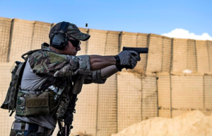 US Air Force pararescueman aiming a Glock 19