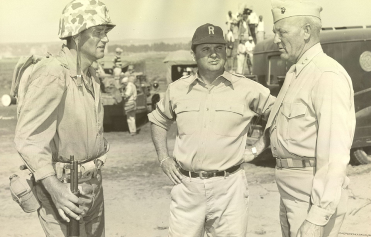 Graves Erskine standing with John Wayne