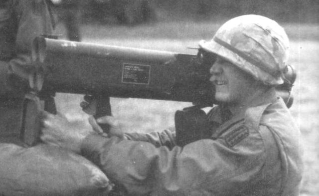 Soldier aiming an M202 FLASH