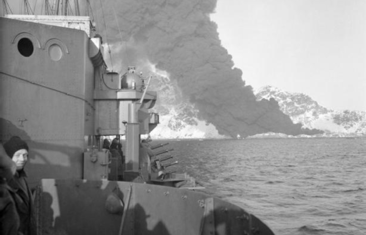 Woman standing on the deck of the HMS Legion (G74)