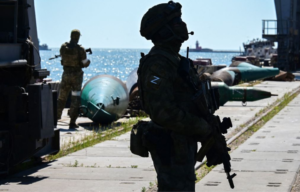 Russian soldier standing in shadow