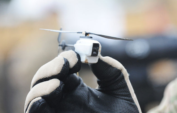 Hand holding up a Black Hornet Nano