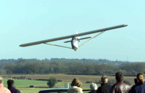 Crowd watching the replica of the Colditz Cock in flight