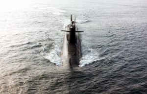 Submarine surfacing in the water