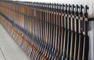 Swiss K31 rifles lined up against a wall