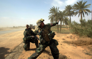 US Marine preparing to throw a grenade