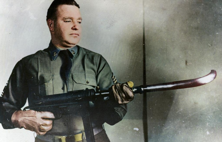 US soldier holding an M3 with a curved barrel