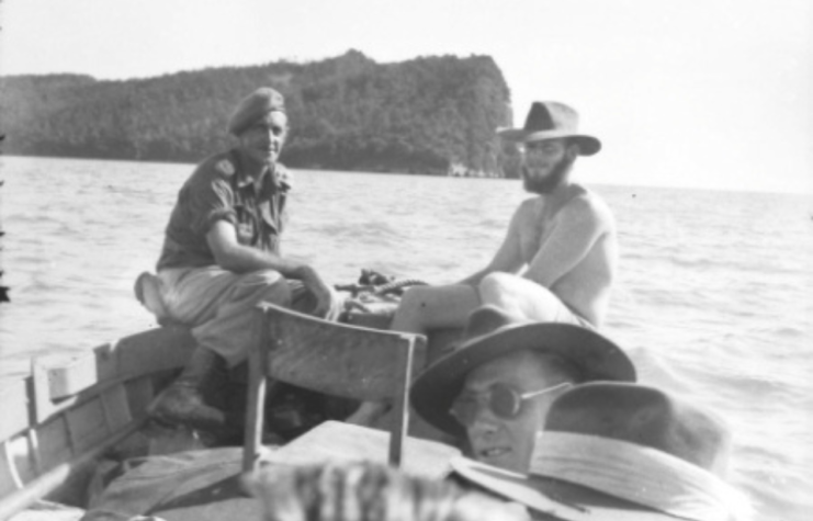 Jock McLaren and others sitting in a boat